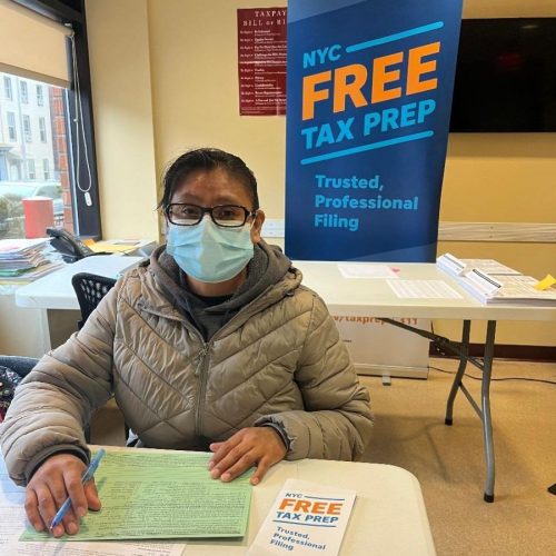 Woman Getting Assistance with Tax Filing A first time client receiving tax filing services at CFL!